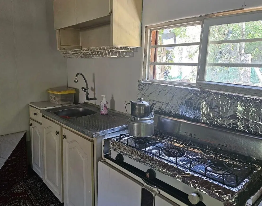 کلبه حیاط دار گردو در کرمانشاه
