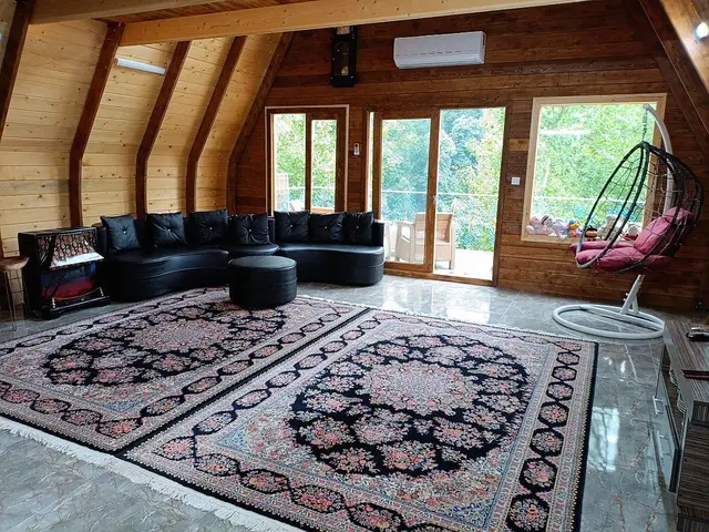 کلبه چوبی سوئیسی خان عمو 