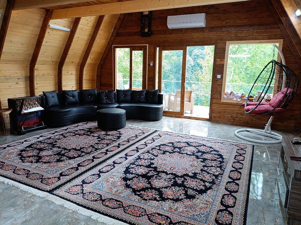 کلبه چوبی سوئیسی خان عمو 